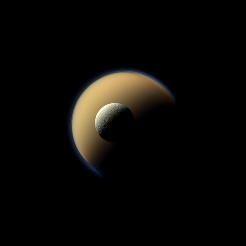 An image of Titan and Rhea, two moons of Saturn | NASA